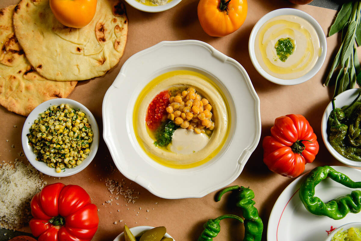 Naked Tomato’s smooth and creamy hummus is a great way to start off the meal.
